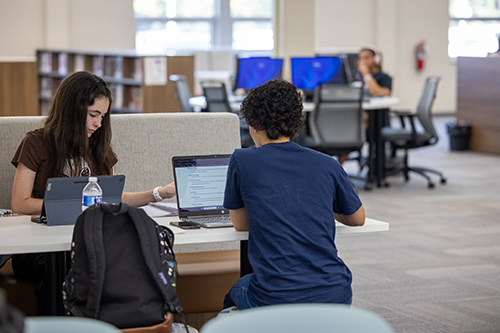 Students read and study in the newly renovated JSCC Learning Commons.