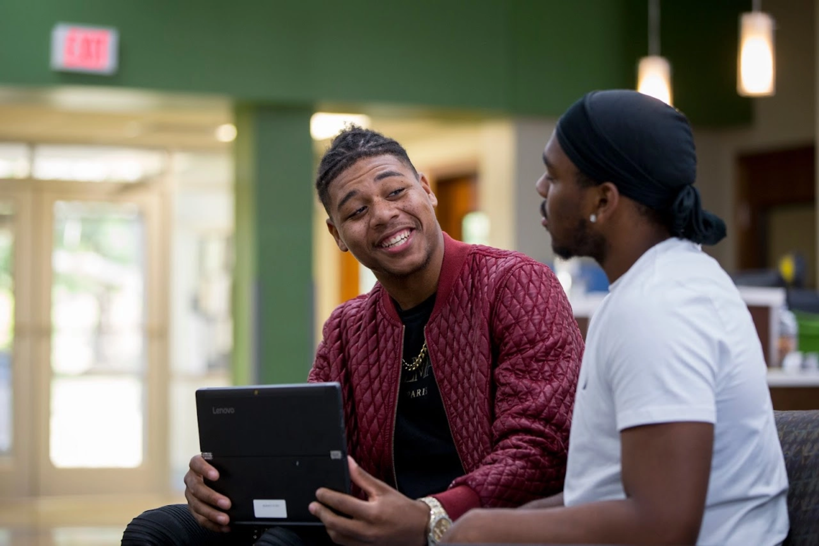 Two male students in conversation