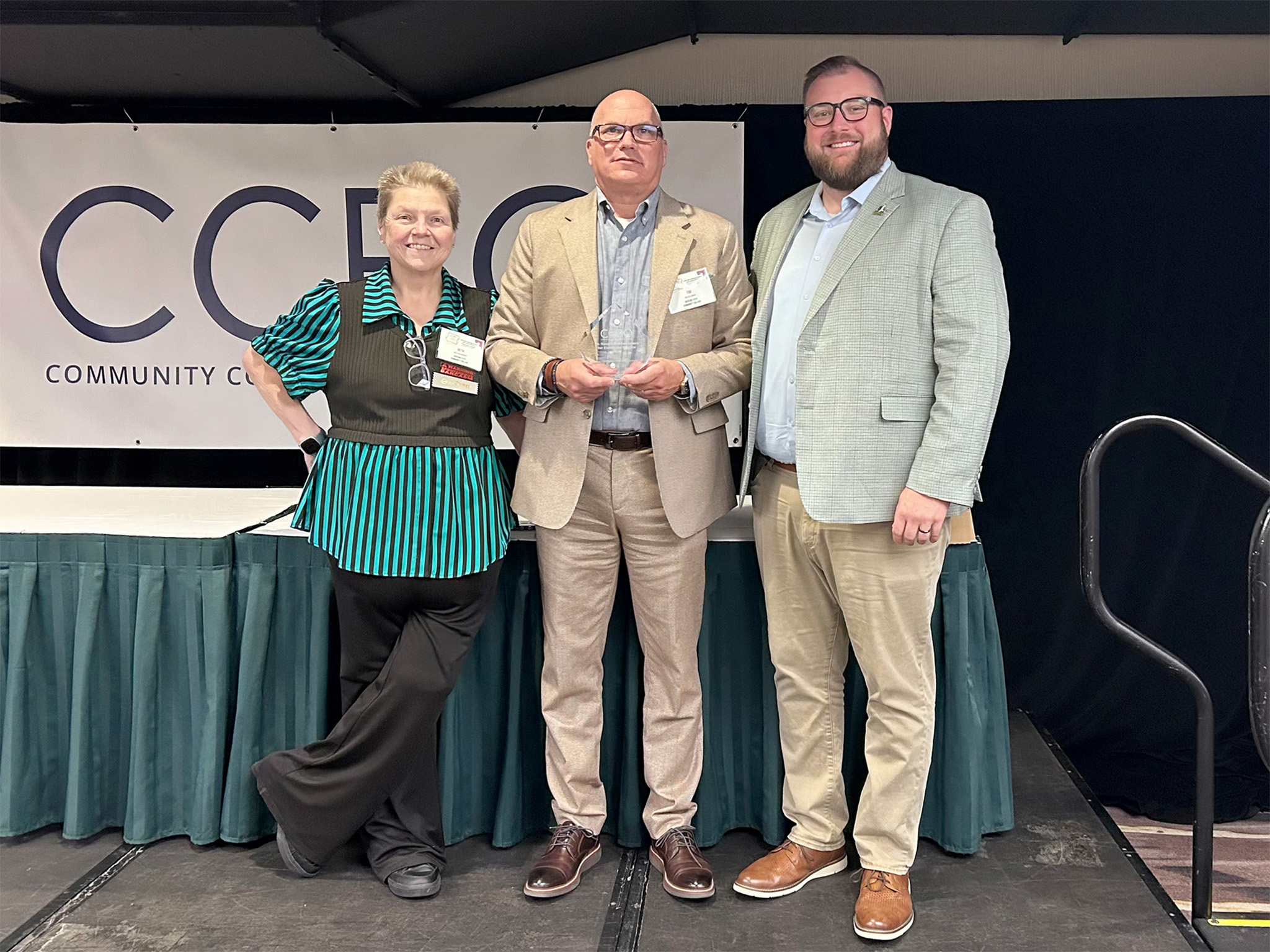 From left, Beth Baligrosky, Assistant Vice President of Financial Reporting; Tim Dellinger, Executive Vice President of Finance, Administration, and Student Services; and Seth Harden, Assistant Vice President of Enrollment Management accepted the award September 24 at the CCBO annual conference in New Orleans.